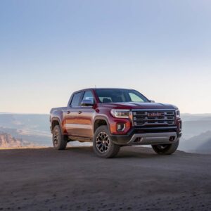 Red GMC truck-GM collision repair at Lorens body shop