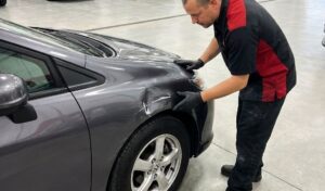 Fender Repair inspection by technician-Lorens Body Shop